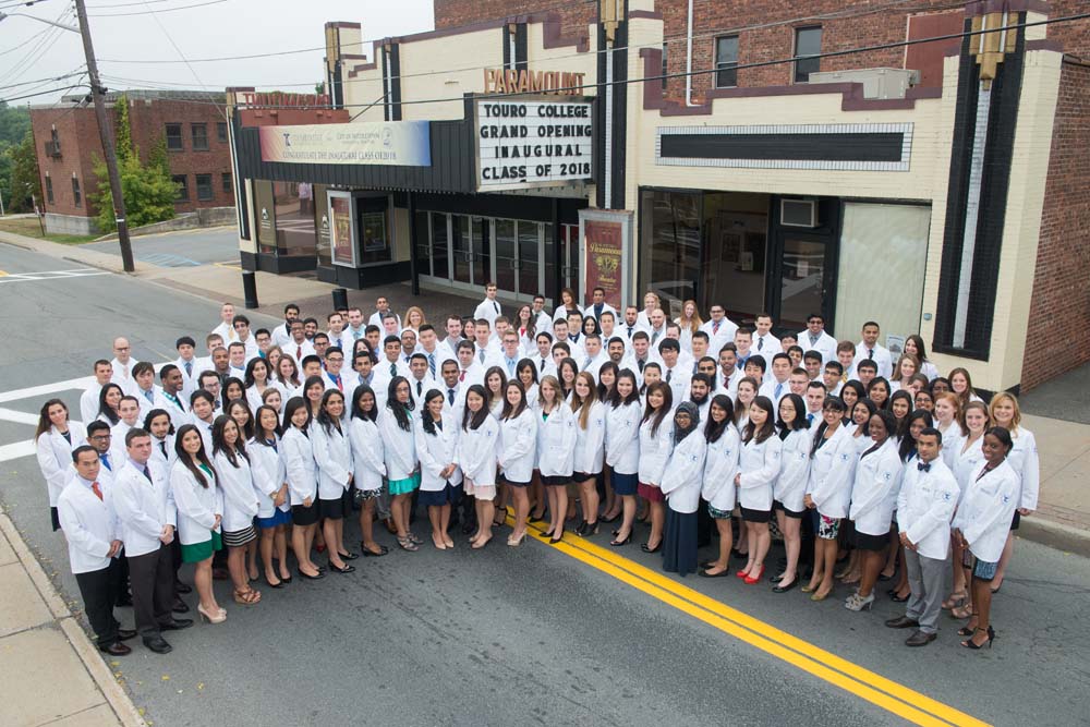 The DO Class of 2018 in front of the Paramount Theatre