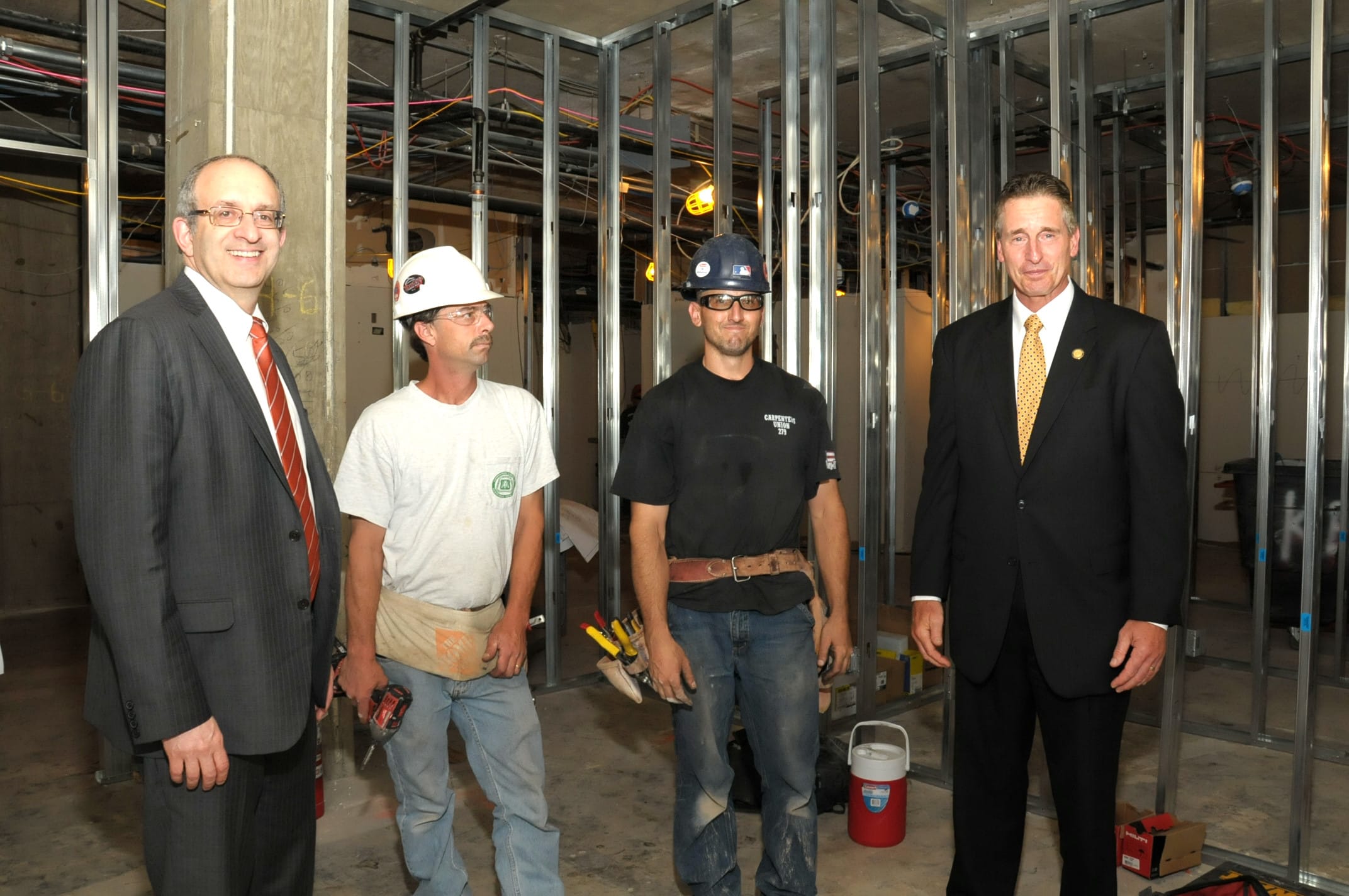 President Kadish (far left) and Lt. Governor Robert J. Duffy (far right) at the former Horton Hospital complex in Middletown, N.Y. where construction is underway on the new Touro College of Osteopathic Medicine.