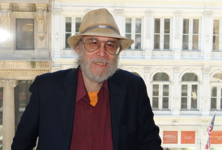 Ira Weinstock poses in his signature fedora