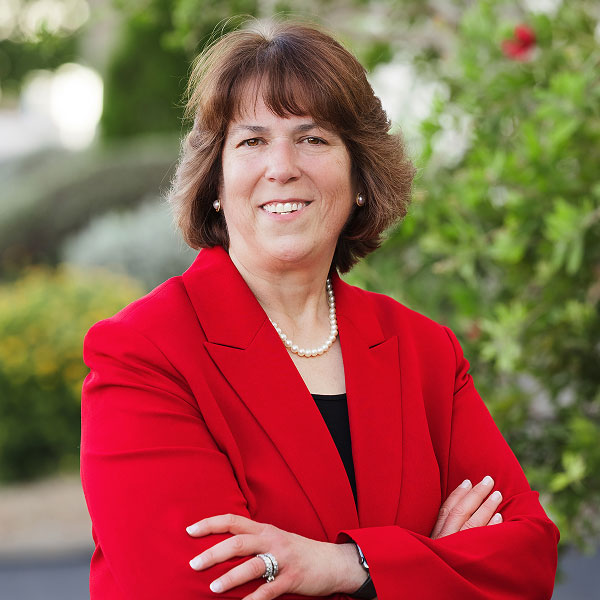 Patricia Salkin smiling and wearing red blazer
